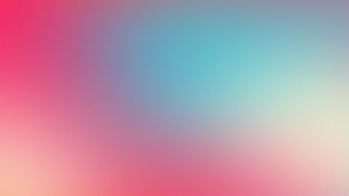 a blurry image of a pink and blue background