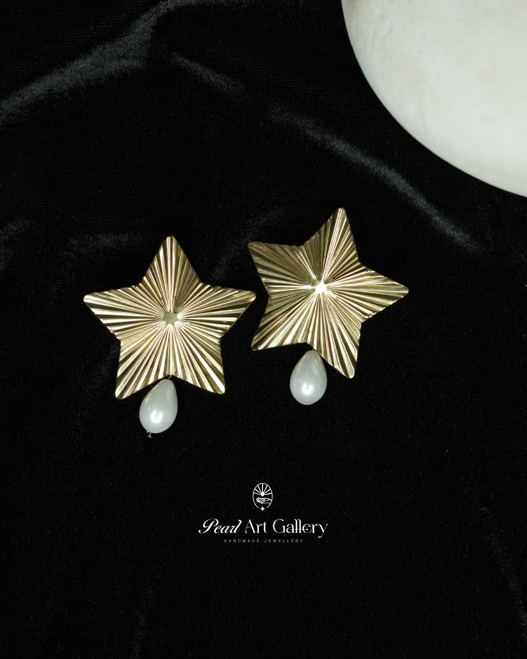 Handmade gold stud earrings with pearls and natural stones