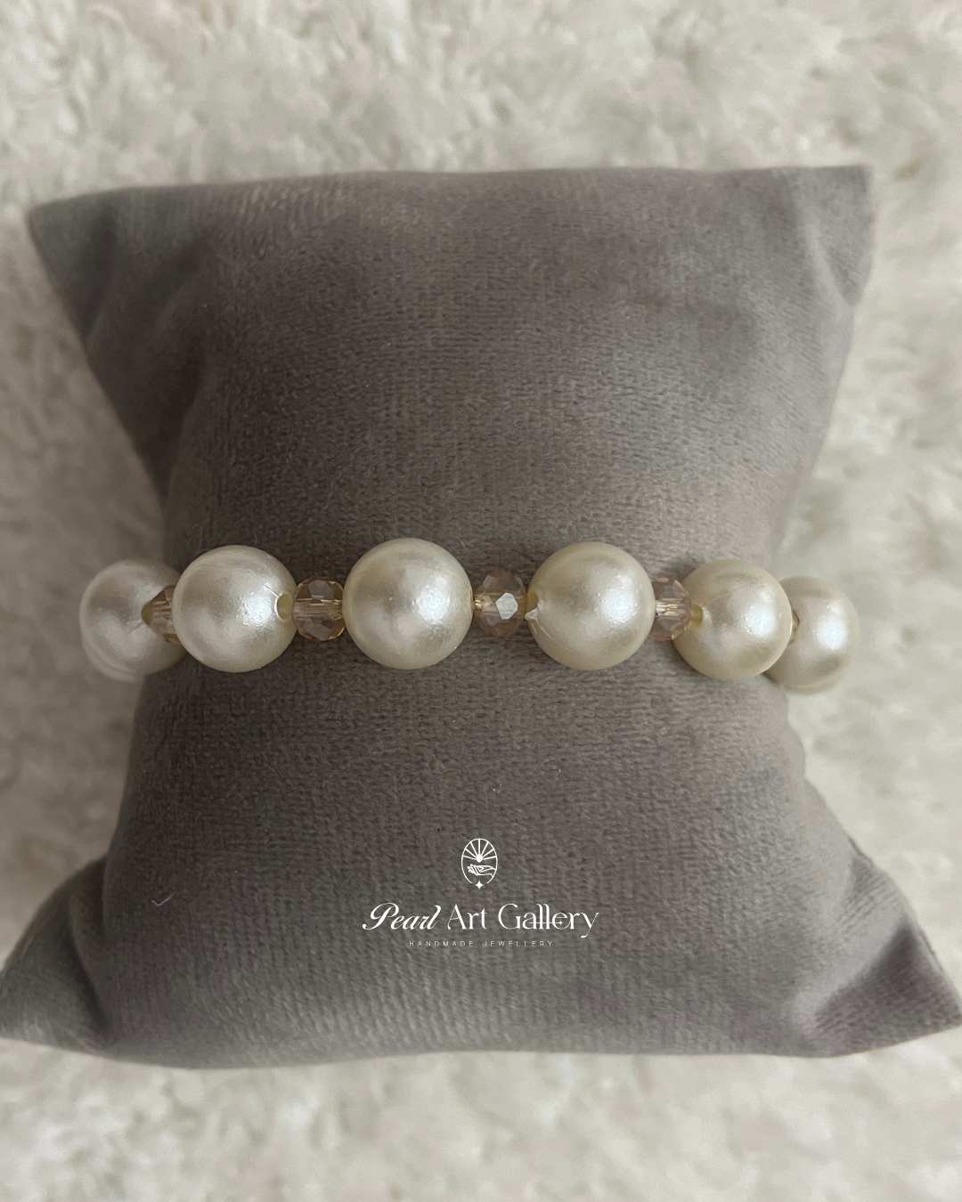 Glass Pearl Rakhi with Champagne Crystal Accents