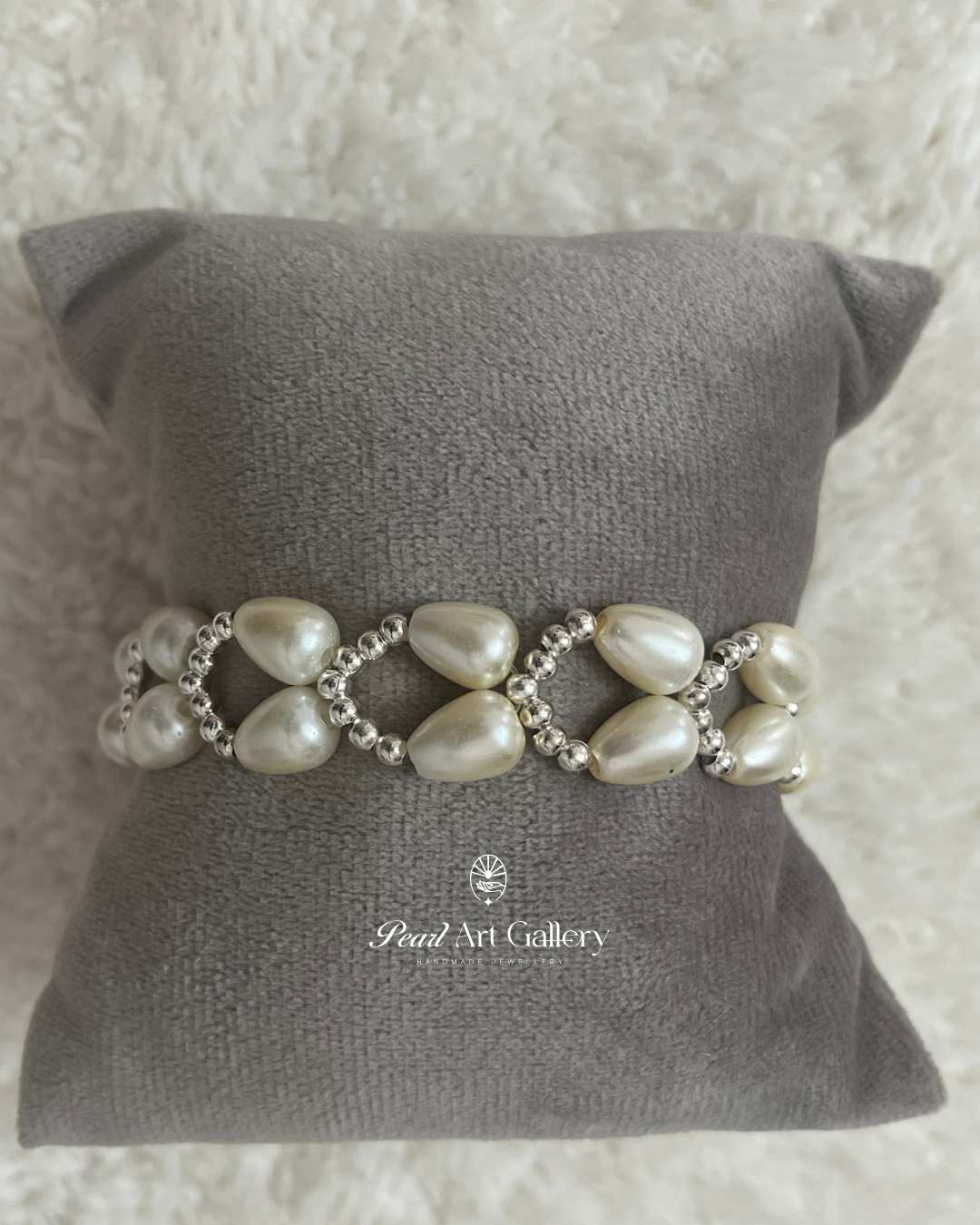 Teardrop Pearl Rakhi – Chain Style with Silver Bead Detailing