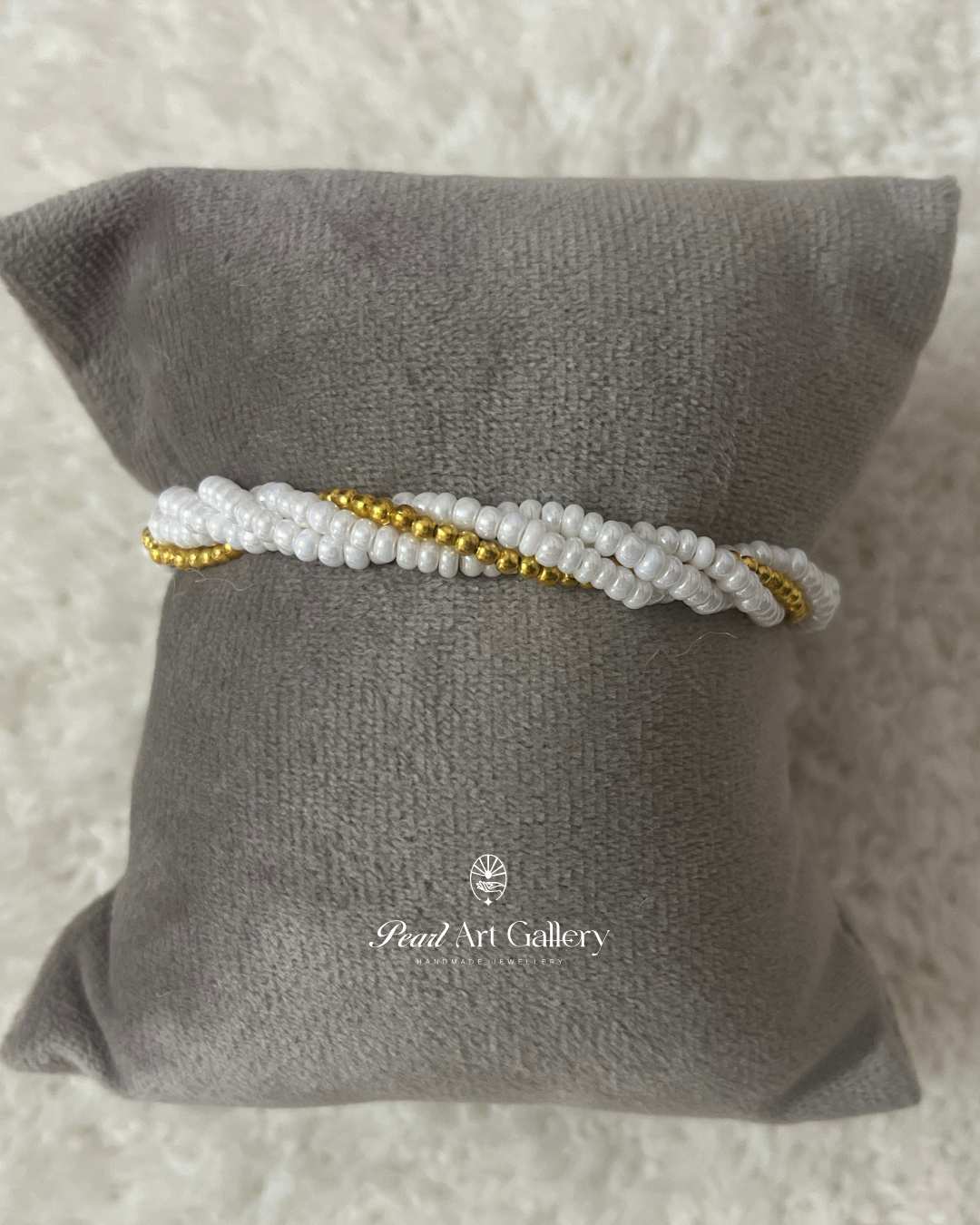 White Pearl Twist Rakhi with Gold Charm – Chain Style