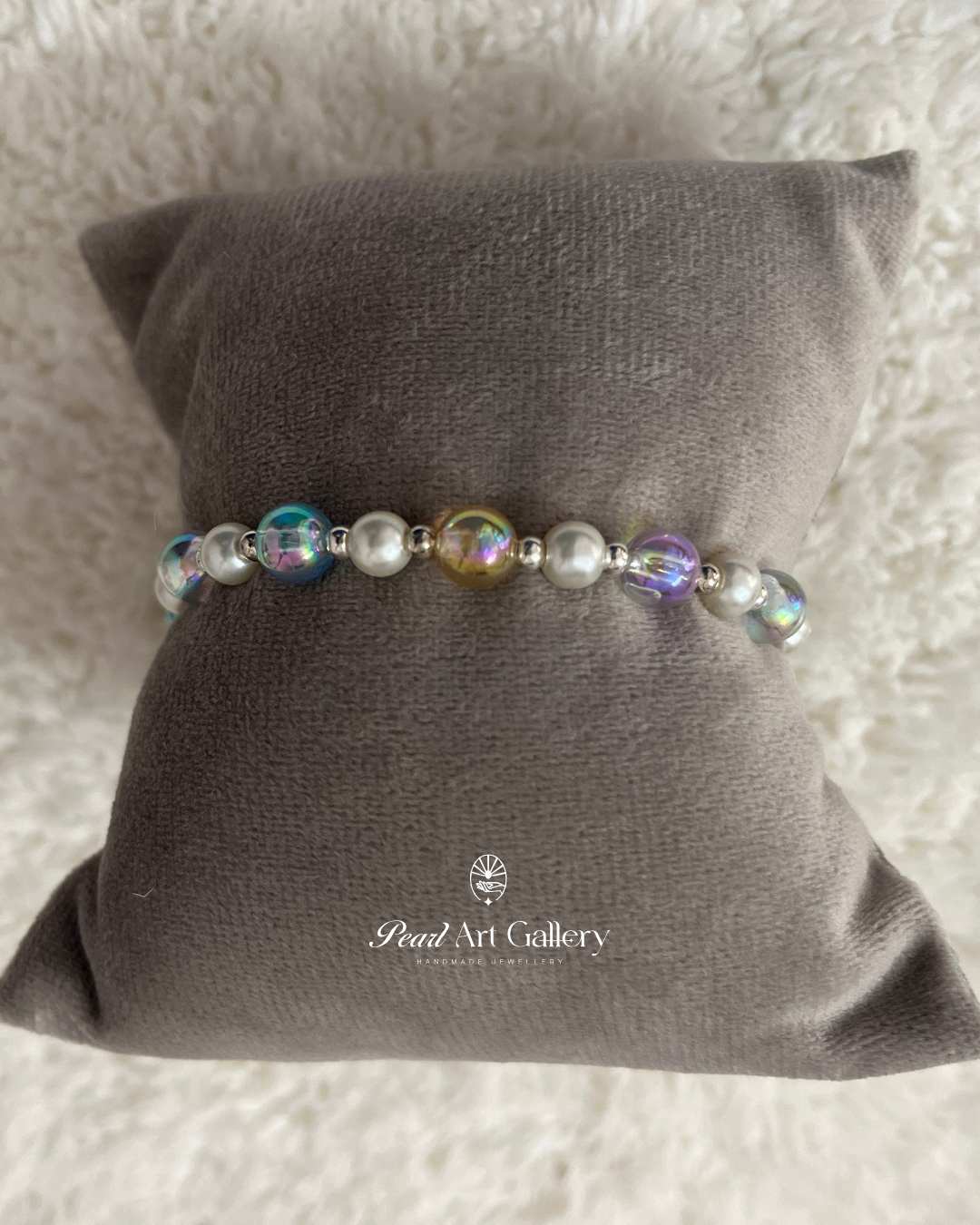 Iridescent Bead Rakhi with Pearl Charm