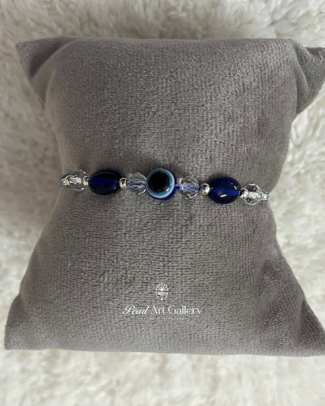 Blue Evil Eye Rakhi with Crystal Shine - Pearl Art Gallery